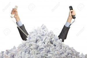 12346850-man-with-lots-of-crumpled-paper-stock-photo-overload-call-information
